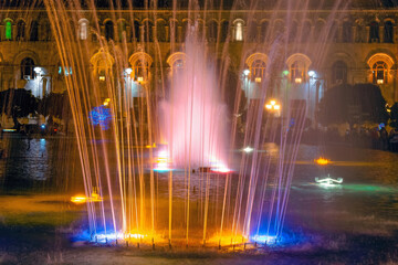 Singing and Dancing Fountains in Republic Square in Yerevan. Night city lights show.