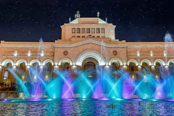 Fototapeta premium Singing and Dancing Fountains in Republic Square in Yerevan. Night city lights show.