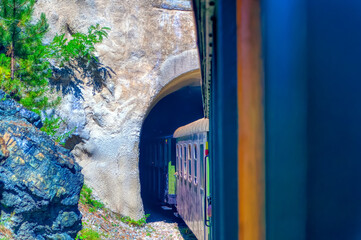 Train Nostalgia entering tunnel at Mokra Gora, Serbia.