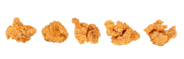 Piece of fried popcorn chicken isolated on white background © PotaeRin