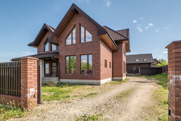 Fototapeta premium two-story concrete or brick country house