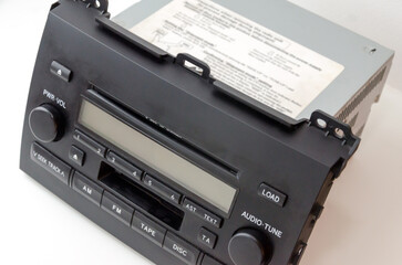 Obraz premium Old car audio player 2 DIN. On a white background