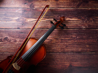 High angle view of a violin on a wood table
