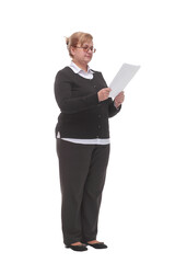 Side view of serious mature woman reading documents