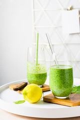 Healthy green smoothie, spinach, lemon.