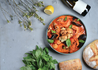 Seafood cacciucco is a popular dish in Italy. Background for the menu. View from above
