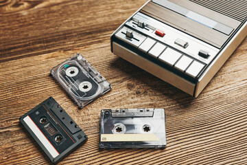Compact cassette tapes and cassette recorder. Retro music style. 80s music party. Vintage style....