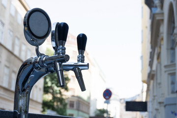 Closeup double tap beer serving street events