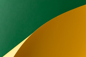 Green and yellow folded paper abstract background