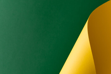 Green and yellow colored paper abstract background