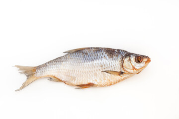Dry fish. Seafood snack for beer. Salted sun-dried, jerked or smoked fish. Taranka, vobla. Russian or Ukrainian food. Caspian roach fish. Dead fish. High resolution photo. On white background