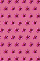 Pink chrysanthemums in geometric grid pattern on a calm pink background. Vertical floral wallpaper 