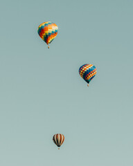 Fototapeta premium Hot air balloons flying in the blue sky
