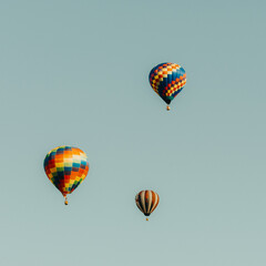 Hot air balloons flying in the blue sky