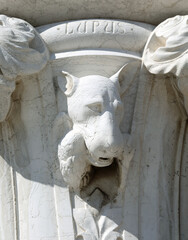 statue of a Wolf s muzzle with the inscription LUPUS  on the column of the Italian Palace