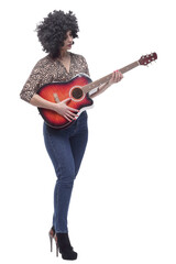 Fototapeta premium in full growth. stylish young woman with a guitar .