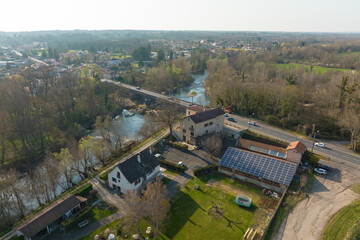 Aerial view of residential houses in green suburban rural area
