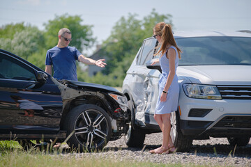 Two drivers having argument over who is guilty in car crash accident. Road safety and insurance...