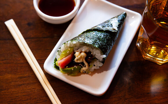 Temaki salmon. Oriental meal. High quality photo