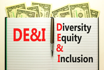 DEI Diversity equity and inclusion symbol. Concept words DEI diversity equity and inclusion on the white note on beautiful dollar background. Business DEI diversity equity and inclusion concept.