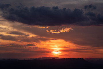 Beautiful orange clouds on sunset sky in Chapada dos Veadeiros