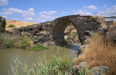 Jisr el-Majami or Meeting Bridge, an ancient basalt bridge of Roman origin, over the Jordan River...