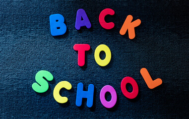Back to school colored letter signs and various school supplies