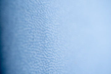 detalle de cobertura de agenda de plástico azul cielo con textura de puntos - obrazy, fototapety, plakaty
