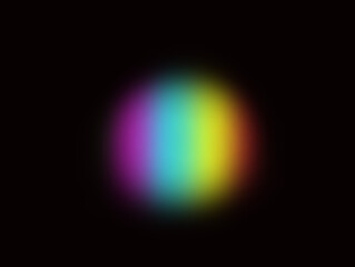 Abstract blurred rainbow circle on black background