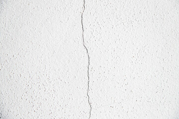 Rough white wall with cracks. Degradation concept.
Abstract textured white background.