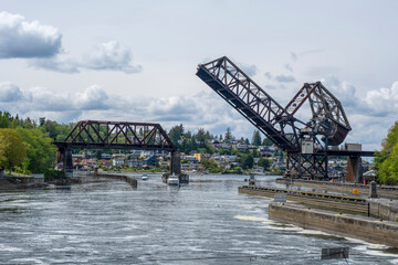 Fototapeta na wymiar Train bridge raised in Seattle boating area