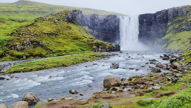 Fantastic godafoss waterfall in Iceland with rocks and grass.