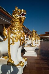 The Leo or lion serves as protection. Preserving the place at Wat Phra That Choeng Chum Worawihan It is an important sacred place of the house. couple from ancient times.