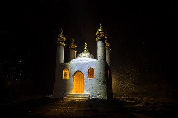 A realistic Mosque miniature with windows at night. Festive greeting card, invitation for Muslim...