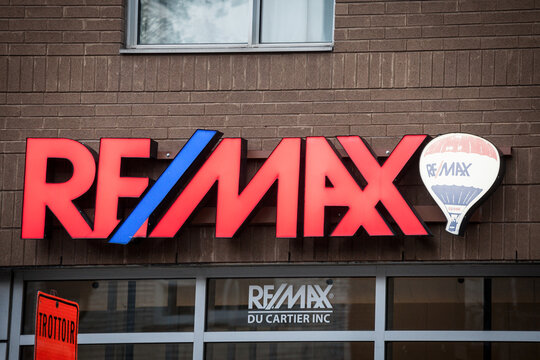 MONTREAL, CANADA - NOVEMBER 6, 2018:  Remax logo on their main local franchise office in Montreal, Quebec. Remax is an American franchiser of Real Estate businesses spread worldwide