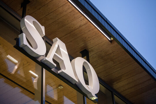 MONTREAL, CANADA - NOVEMBER 9, 2018: SAQ logo on their main shop for Montreal center. Also known as Societe des Alcools du Quebec, it sells spirits, alcool, wine and beer