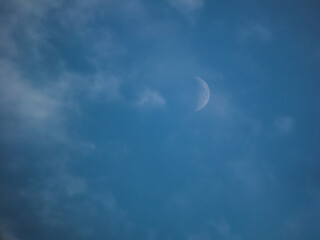 Naklejka na ściany i meble Photo of cloudy sky and moon