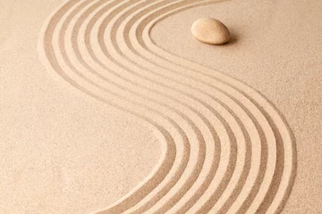 Acrylic prints Stones in the sand stone on sand with zen pattern. meditation harmony concept.