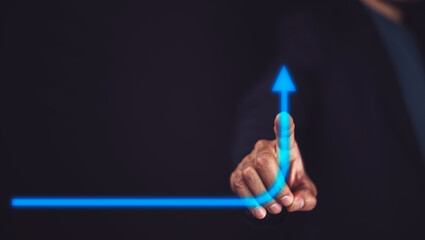 Businessman pointing arrow graph corporate future growth plan, Business development to success and growing growth concept.