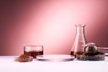 Front view of coffee decorated in transparent podium and glassware laboratory equipment pink background