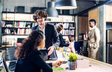 Group of business meeting and discussing strategy with startup project analysis finance process.Success business people plan and brainstorm marketing idea with document in office.Teamwork