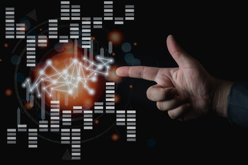 Businessman hand point deciding on goal with black background.