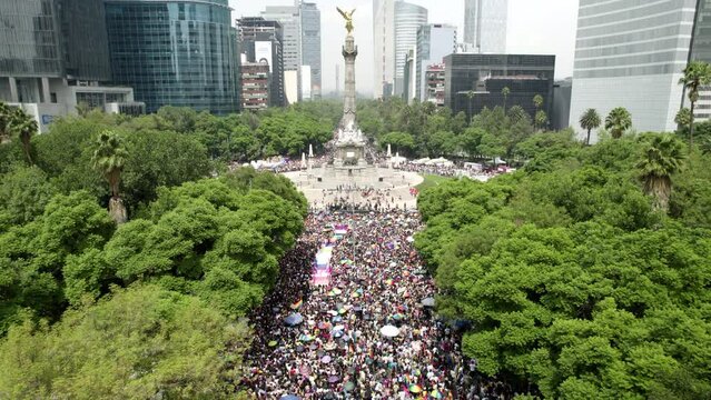 aerial shot in elevation of the pride parade in the paseo de la reforma in mexico city