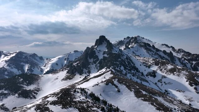Aerial drone footage of Ciucas Mountain summit. Top of the mountain. Sunny day