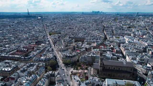 Saint-Vincent de Paul Catholic Church And Gare du Nord Transit station In Paris, France. - aerial