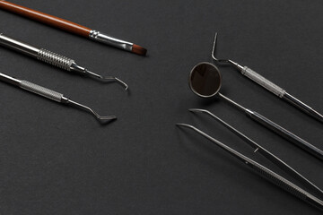 Set of metal dental instruments for teeth dental care