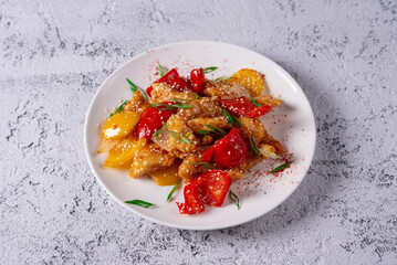 Salad of chicken meat and vegetables. on a light concrete background