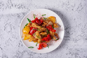 Salad of chicken meat and vegetables. on a light concrete background