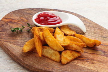 Fried rustic potato with tomato ketcup