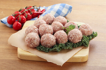 Raw pork meatball for cooking